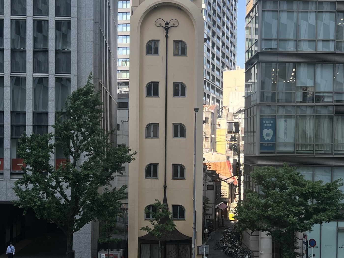 Osaka's mix of low-rise heritage buildings and glass towers, often standing on the very same block.