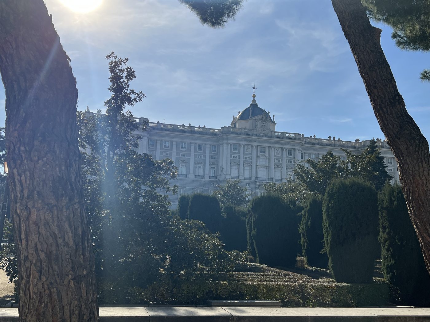 Madrid's Royal Palace gardens — formal, shaded, and a world away from the summer heat a few streets over.